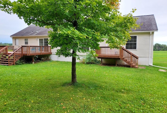 view of yard with a deck