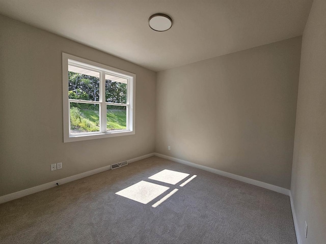 view of carpeted spare room