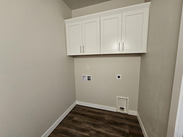 laundry room with hookup for a washing machine, cabinets, dark wood-type flooring, and electric dryer hookup