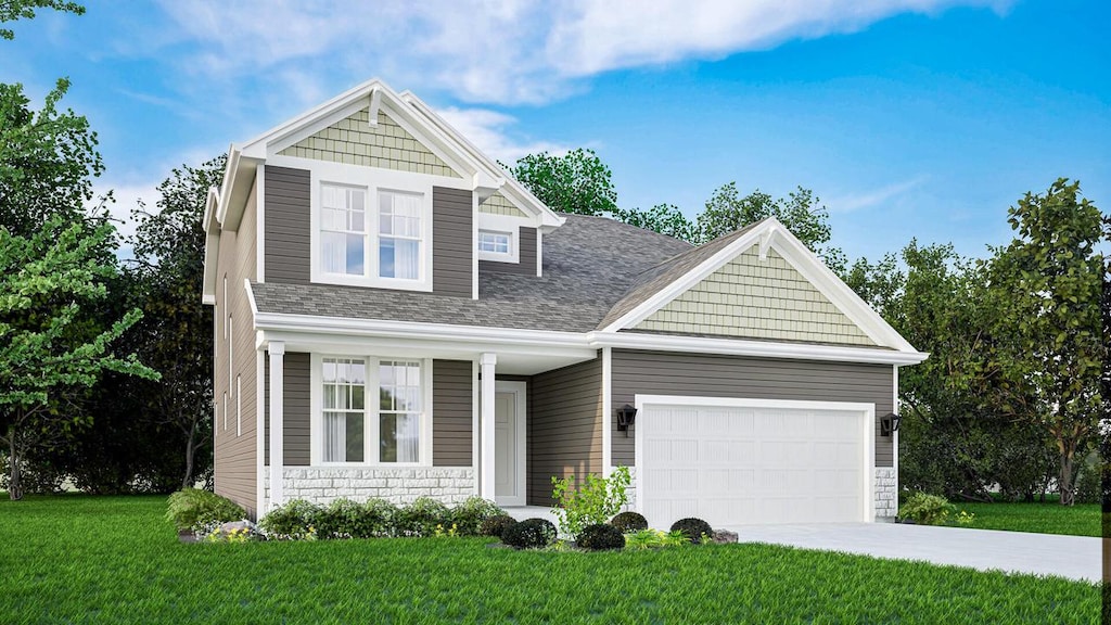 craftsman-style home with a garage and a front lawn