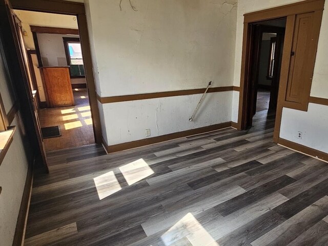 empty room featuring dark hardwood / wood-style floors