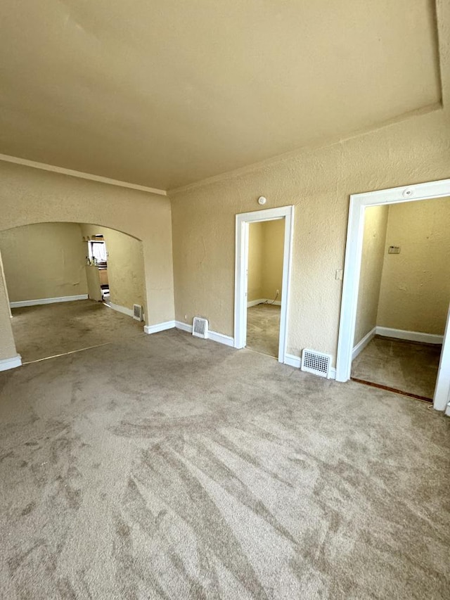 unfurnished bedroom with carpet floors and a closet