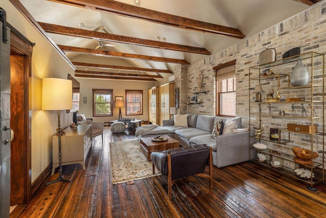 living room featuring a barn door, vaulted ceiling with beams, dark hardwood / wood-style flooring, and ceiling fan