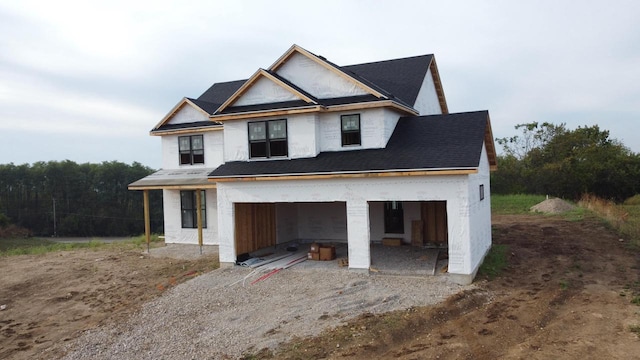 view of side of home with a garage