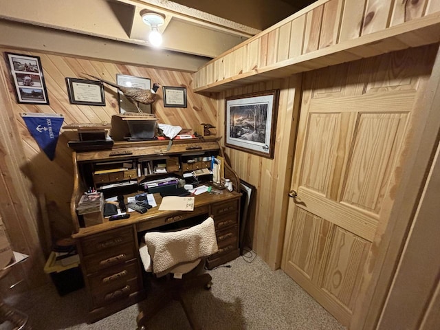 office with wood walls and carpet