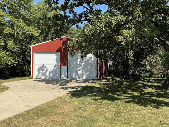 garage with a lawn