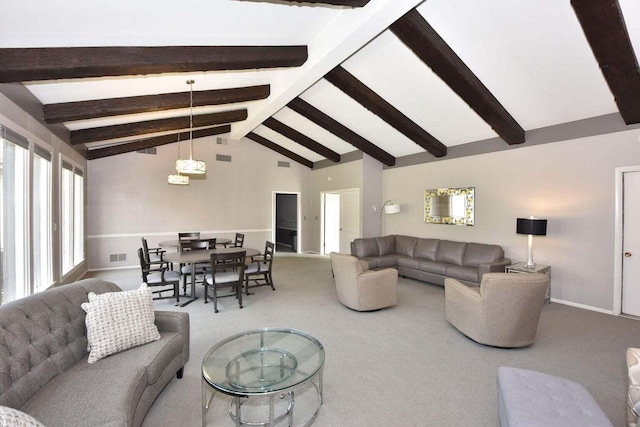 living room featuring beam ceiling, carpet floors, and high vaulted ceiling