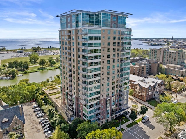 view of building exterior with a water view