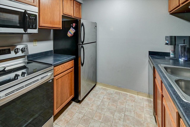 kitchen with stainless steel appliances and sink