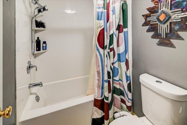 bathroom with shower / bathtub combination with curtain and toilet