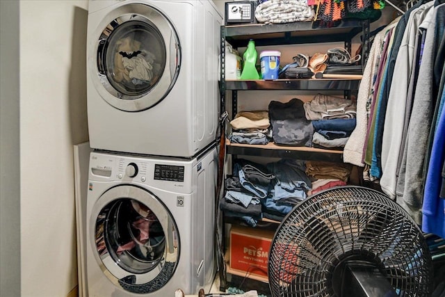 washroom with stacked washer and clothes dryer