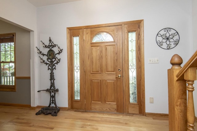 entryway with light hardwood / wood-style floors