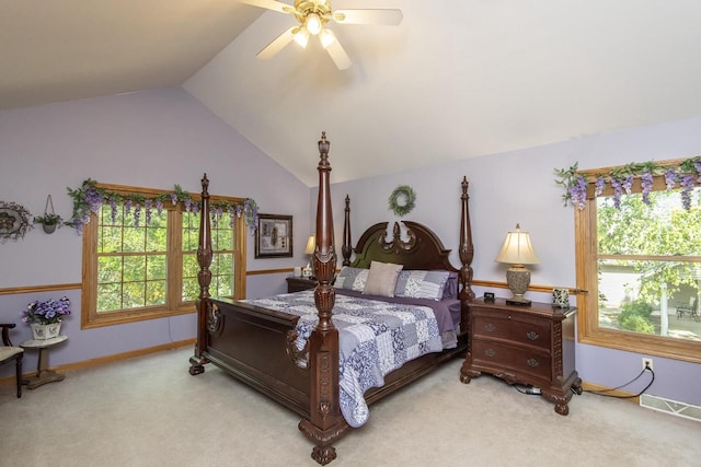 carpeted bedroom with lofted ceiling and ceiling fan