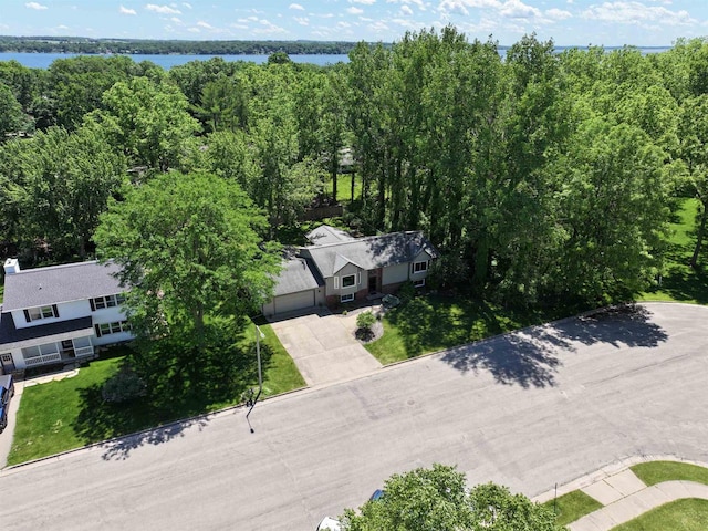 birds eye view of property featuring a water view