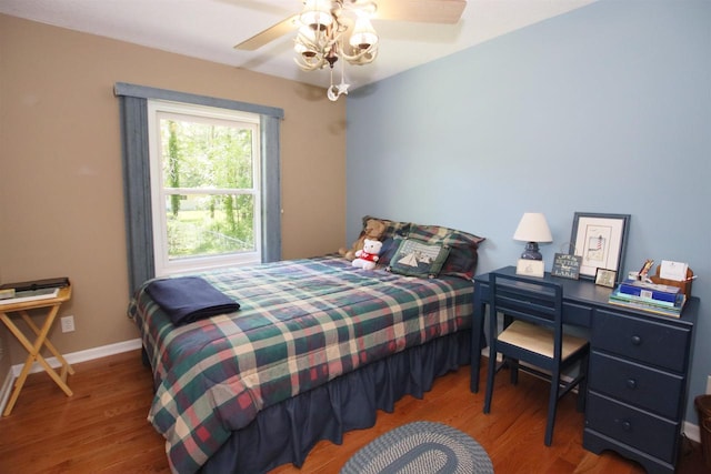 bedroom featuring ceiling fan and hardwood / wood-style floors