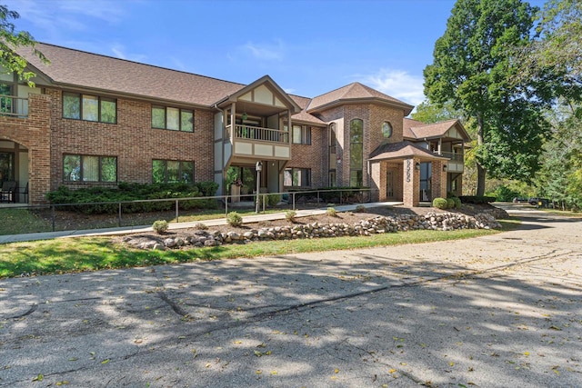 view of front of property with a balcony