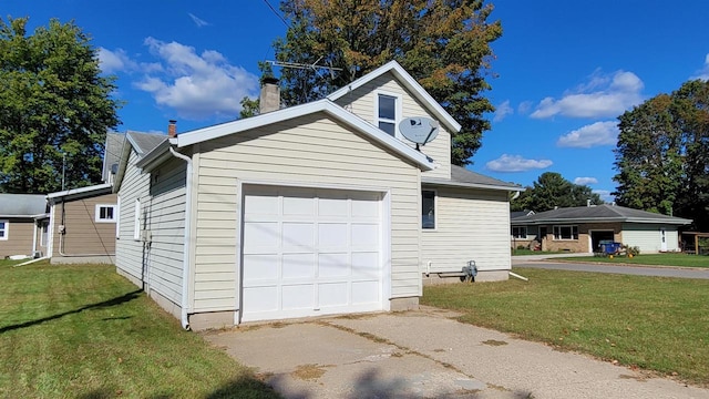 view of side of property featuring a yard