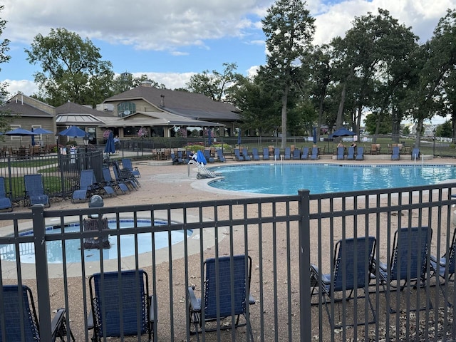 view of swimming pool with a patio area