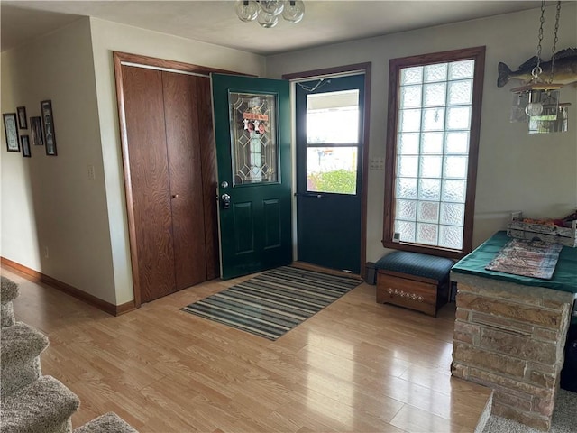 entrance foyer featuring hardwood / wood-style flooring