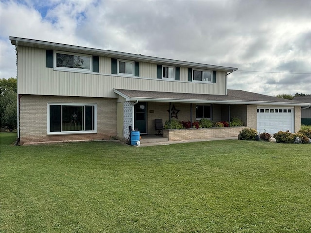 front of property featuring a porch, a front lawn, and a garage