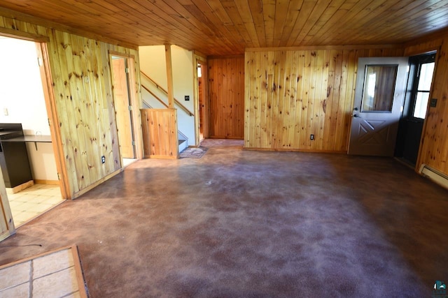 interior space with wood walls and wooden ceiling