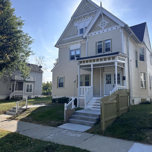 victorian house featuring covered porch