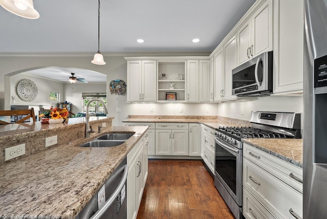 kitchen featuring ceiling fan, white cabinets, sink, dark wood-type flooring, and stainless steel appliances