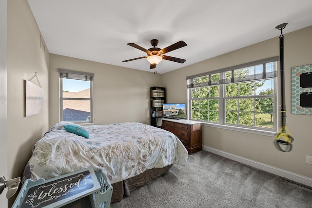 carpeted bedroom featuring ceiling fan