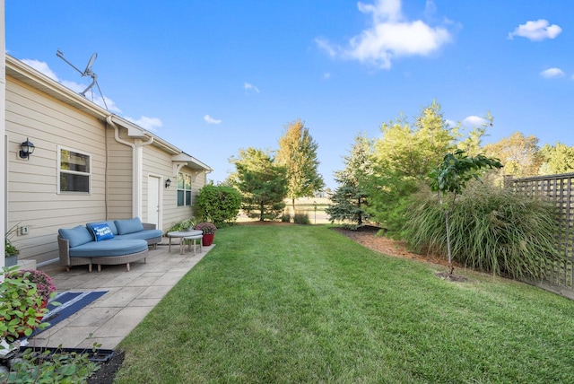 view of yard with a patio and an outdoor living space