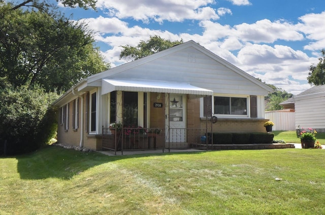 bungalow with a front yard