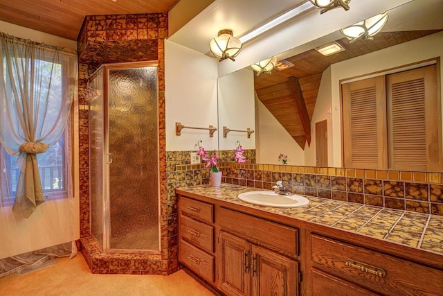 bathroom featuring vanity, wood ceiling, and a shower with shower door