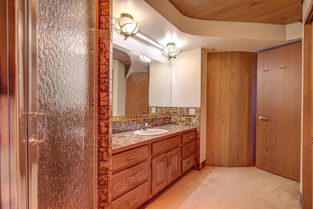 bathroom with vanity, wood ceiling, wood walls, and a shower with shower door