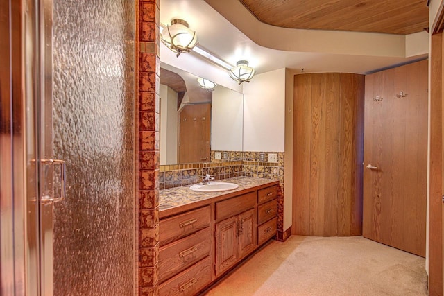 6147 County Rd E, Phelps, WI 54554 - bathroom featuring tasteful backsplash and vanity