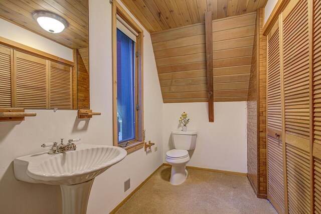 6147 County Rd E, Phelps, WI 54554 - bathroom with wood ceiling, vaulted ceiling, and toilet