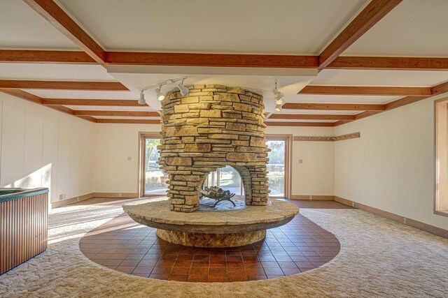 6147 County Rd E, Phelps, WI 54554 - unfurnished living room featuring plenty of natural light, carpet, and beam ceiling