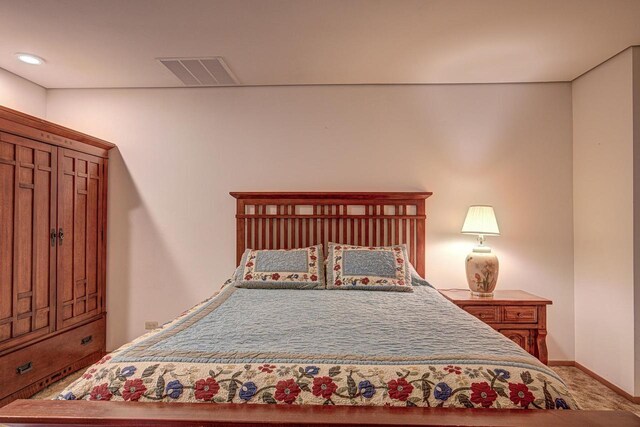 6147 County Rd E, Phelps, WI 54554 - bedroom with visible vents, carpet, and baseboards