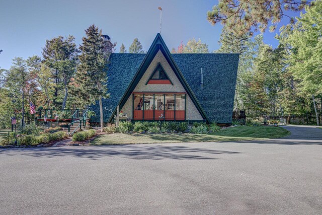 6147 County Rd E, Phelps, WI 54554 - a-frame home featuring roof with shingles and a chimney