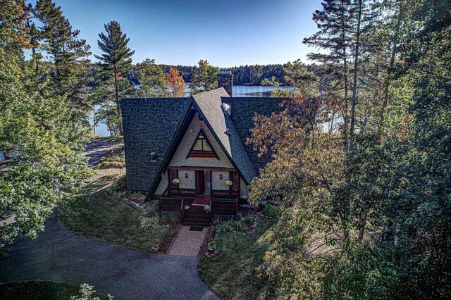 6147 County Rd E, Phelps, WI 54554 - a-frame home featuring roof with shingles and a chimney
