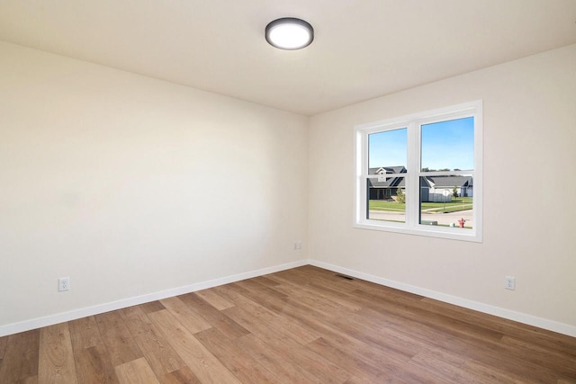 empty room featuring light hardwood / wood-style floors