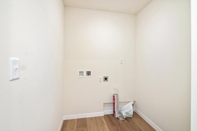 clothes washing area featuring washer hookup, hardwood / wood-style floors, and electric dryer hookup