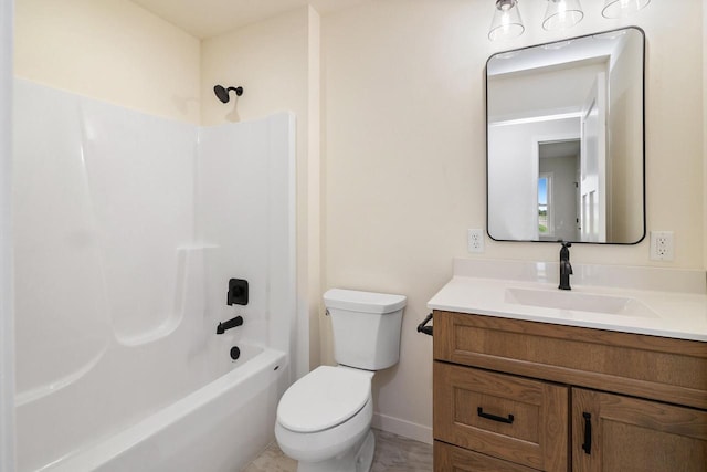 full bathroom with toilet, vanity, and washtub / shower combination