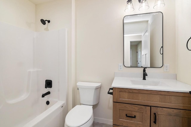 full bathroom featuring toilet, bathtub / shower combination, and vanity