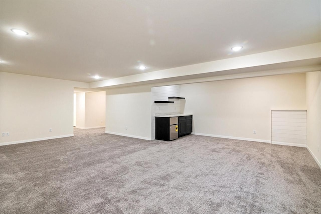 basement with carpet flooring