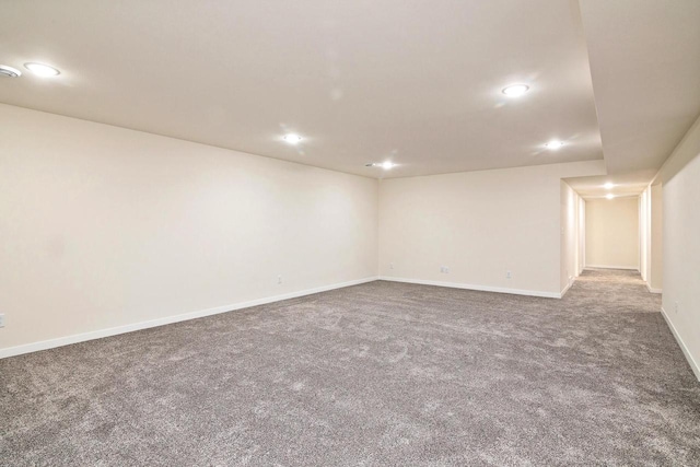 interior space with dark colored carpet