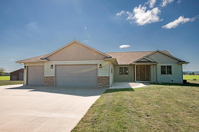 single story home featuring a garage and a front yard