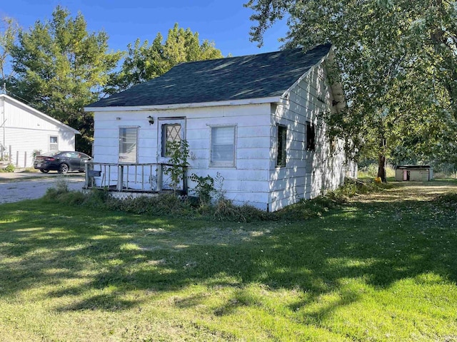 exterior space with a yard