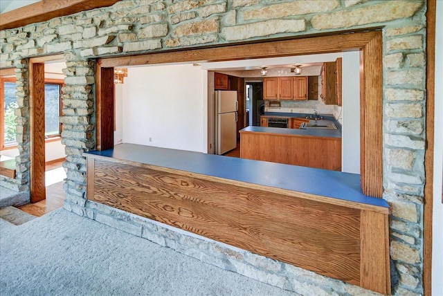 interior space featuring light wood-type flooring and white refrigerator