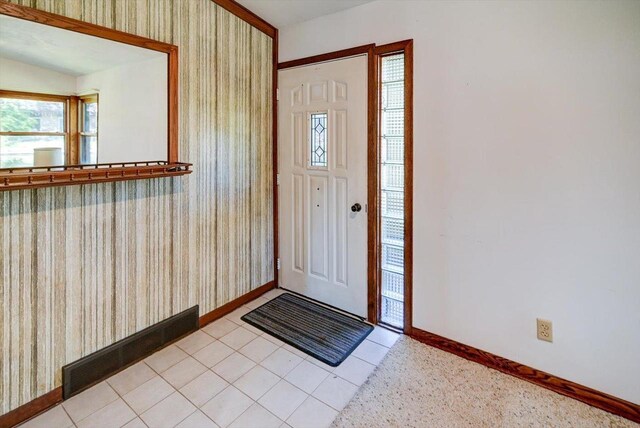 2809 Dewey Ct, Middleton, WI 53562 - foyer entrance with baseboards, wallpapered walls, and light tile patterned floors