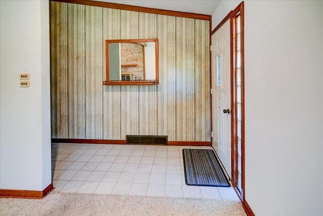 2809 Dewey Ct, Middleton, WI 53562 - hallway featuring baseboards, visible vents, tile patterned floors, and wallpapered walls