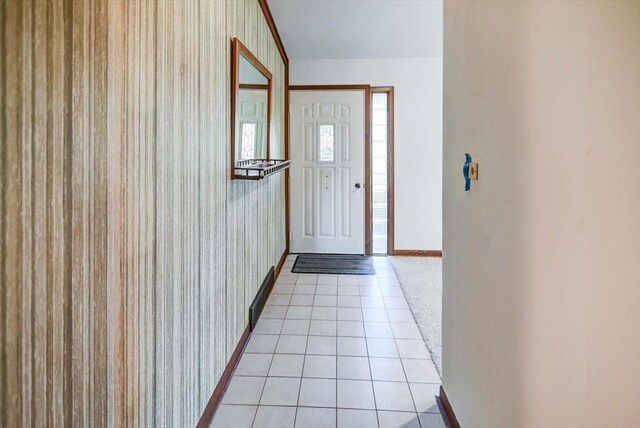 2809 Dewey Ct, Middleton, WI 53562 - doorway to outside with baseboards, wallpapered walls, and light tile patterned floors